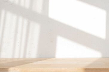 Wall Mural - product presentation wooden table on blur abstract texture cement wall with soft sun light window sh