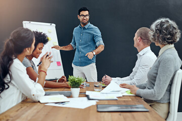 Aufkleber - Businessman, boardroom or presentation with whiteboard for team meeting, analytics or analysis at office. Coach, speaker or talk with sales group, bar chart or graph for statistics, review or report
