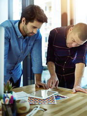 Aufkleber - Talking, tablet and teamwork with designer men at desk in office together for decision or planning. Collaboration, conversation and pointing with employee team in creative workplace for productivity