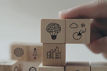 Aufkleber - Hand arranging wooden blocks with idea icons