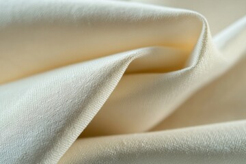 Poster - A soft, cream-colored fabric with subtle texture and elegant folds, creating a serene and versatile background for various design and artistic applications.