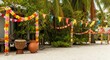 © Tati - Tropical beach decorated with colorful garlands and flags for festive event or holiday celebration