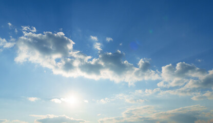 Wall Mural - beautiful blue sky with soft white clouds for abstract background