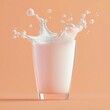 © boler - A clear glass with milk splashing against a neutral background