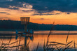 © Adam - lake landscape during the rising sun. dawn over the lake. lake in the morning in summer. beautiful colors over the water in the morning, the sun above the horizon over the water.