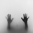 © Jiri - Blurry Black-And-White Capture of Two Hands Reaching out From Behind Foggy Glass, Evoking Mystery and an Eerie Atmosphere