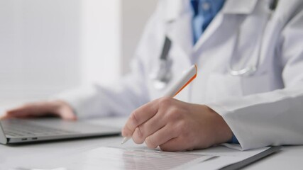 Poster - A dedicated healthcare professional is actively involved in the important process of patient documentation, ensuring accurate records and effective communication within the healthcare system