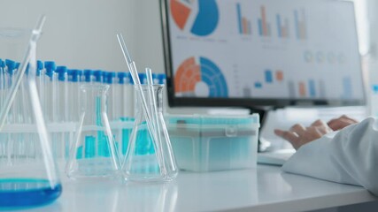 Aufkleber - This document discusses the comprehensive setup for conducting laboratory research, featuring test tubes and the meticulous process of analytical data analysis to enhance scientific innovations
