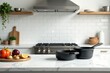 © Thanwara - White marble countertop with cast iron cookware, appliances, cookware
