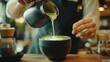 © coroze - Pouring Smoothened Green Tea in Elegant Bowl with Beautiful Design