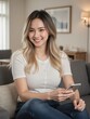 © Joedifries - happy woman sitting on a comfortable couch at home, smiling while using her cellphone, enjoying a quiet and relaxing moment.