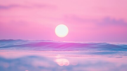 Wall Mural - a serene sunset casting pink hues over gentle ocean waves.