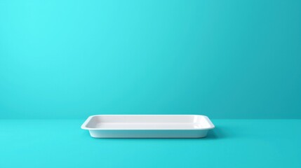 Poster - minimalist white rectangular tray on vibrant turquoise background for stylish kitchen or dining deco