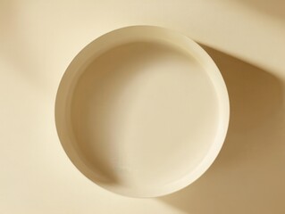 Poster - Minimalist round plate on a soft light background, creating a serene and modern aesthetic for contemporary food photography and culinary art projects