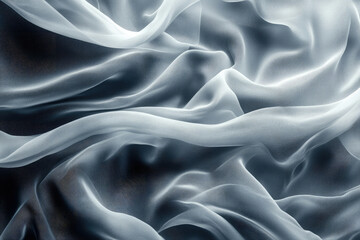 Poster - Elegant, flowing chiffon fabric in soft, muted grey tones, creating a luxurious textile background.