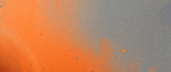 Leinwandbilder - Orange and gray textured background creating dynamic visual contrast