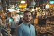 © Aupurbo - Young Muslim entrepreneur leads a retail store, excelling with diverse products and exceptional service, creating a welcoming environment for customers.