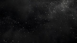 Dark background with white speckles resembling stars or dust, Night sky texture background