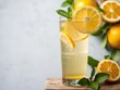 © chanwut - Fresh glass of water with slices of lemon and a drizzle of honey, perfect for a refreshing and tasty beverage, healthy, citrus
