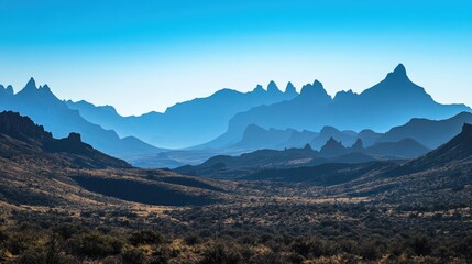 Wall Mural - bathing the chisos mountains in stunning blue light, early morning reveals the rugged beauty nationa