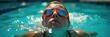 © Jameo - Swimmer with goggles looking up towards surface, depth, rise