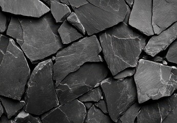 Poster - Textured black slate stone wall background made of irregularly shaped rock pieces perfect for modern design and interior decoration projects.