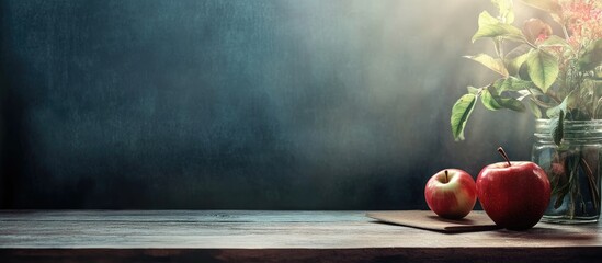 Aufkleber - Modern tabletop scene featuring red and green apples on a wooden surface with soft natural light and blurred chalkboard background for text space