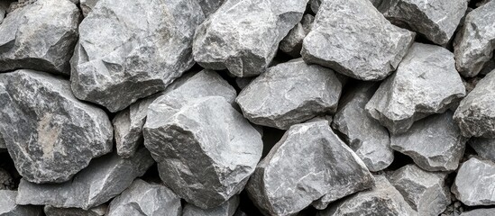 Aufkleber - Textured grey quarry stone background with varied rock shapes and sizes arranged closely together, highlighting natural stone characteristics.