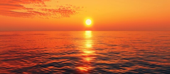 Poster - Vibrant orange sunset over calm ocean waters creating a serene reflection with clear sky and ample copy space for text on the horizon