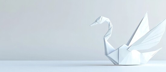 Leinwandbilder - White origami swan gracefully positioned on a minimalist gray background showcasing delicate folds and smooth surfaces with soft lighting.