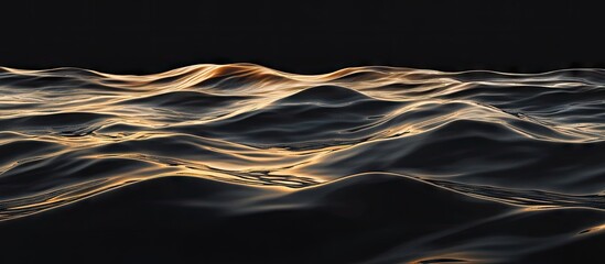 Leinwandbilder - Elegant golden waves ripple across a deep black background, creating captivating contrasts and smooth textures for a striking visual impact.