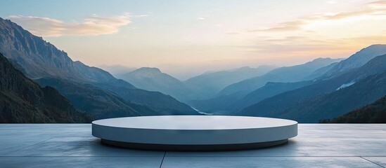 Poster - Minimalist round podium against a sunset mountain backdrop, positioned centrally with a smooth surface, ideal for product presentation and branding.