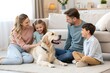 © ARTSPRIO - Family of four sits on the floor with a golden retriever, image, photo