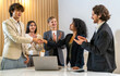 © Art_Photo - Multiracial team collaborating in modern office, diverse colleagues shaking hands during a business meeting, teamwork success, partnership agreement, professional collaboration multicultural workplace