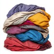 © Suppattra - A pile of used clothes in various colors and textures on a flat surface depicting everyday wardrobe choices