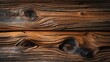 © JuliaM - Wooden planks texture. Brown wood with knots and grain. Two old planks are stacked, showing wood grain and color variations from light to dark.