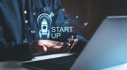 Poster - Startup business concept with digital rocket hologram.
