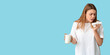 © Pixel-Shot - Young woman with glass of milk and tissue suffering from allergy on blue background