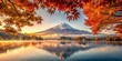© Aumarin - Autumnal Serenity Majestic Mountain Peak Reflected in Still Waters Framed by Vibrant Maple Leaves at Sunrise