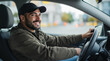 © vstudio - Smiling driver in cap navigates city streets enjoying pleasant drive on bright day