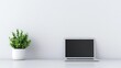 ©  Green Creator - Compact workspace in a small living space with sleek, functional furniture and a laptop, work from home, urban minimalism