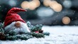 © medi - Festive gnome in snowy landscape with Christmas lights