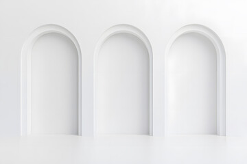 Aufkleber - Minimalist white wall with three arched niches, creating a clean, modern, and architectural focal point. The design emphasizes simplicity and geometric forms.