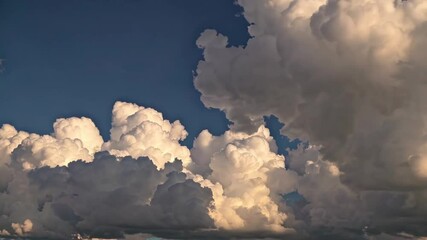 Poster - Massive cumulus clouds against a deep blue sky. Atmospheric photography concept