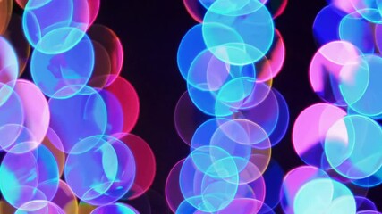 Fototapete - Abstract bokeh lights with vibrant circles in dark background. Festive celebration art