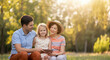© Postmodern Studio - Happy family outdoors: caucasian parents and child enjoying nature