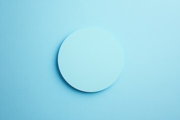 Fototapete - A single light blue colored circle floats against a light blue background