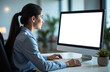 © Екатерина Абатурова - creating comfortable conditions for office workers. A young woman in office clothes is sitting at a computer desk in front of a large computer monitor screen. an empty space for the text.