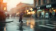 © Alva - A blurred city street scene on a rainy day, featuring pedestrians and reflections on the wet pavement. The soft focus and warm bokeh create a serene, urban atmosphere.