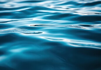 Poster - Serene Water Surface with Gentle Ripples Reflecting Soft Light in Vivid Shades of Blue for Nature, Relaxation, and Tranquility Imagery